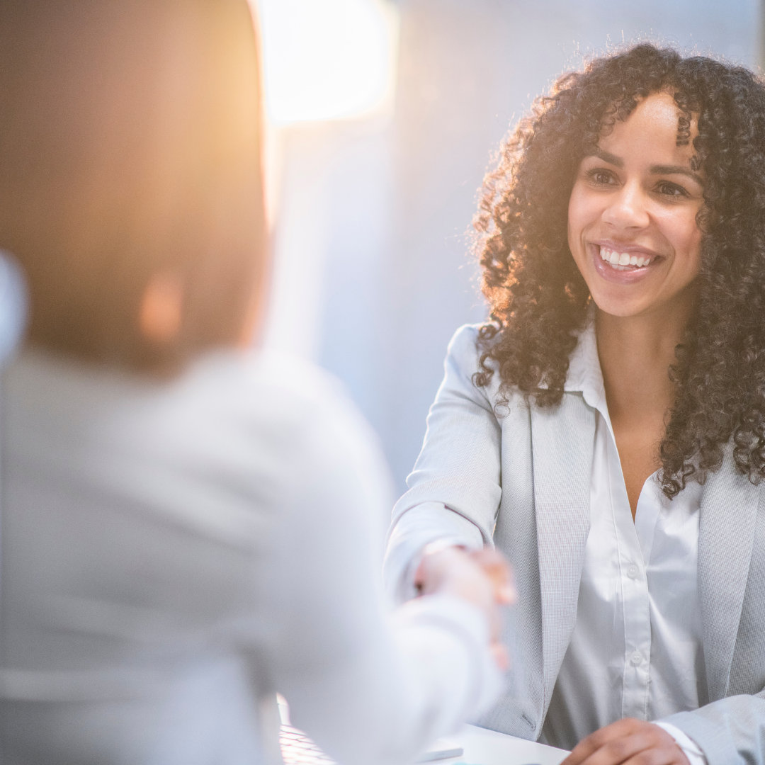 doctor shaking hands with client